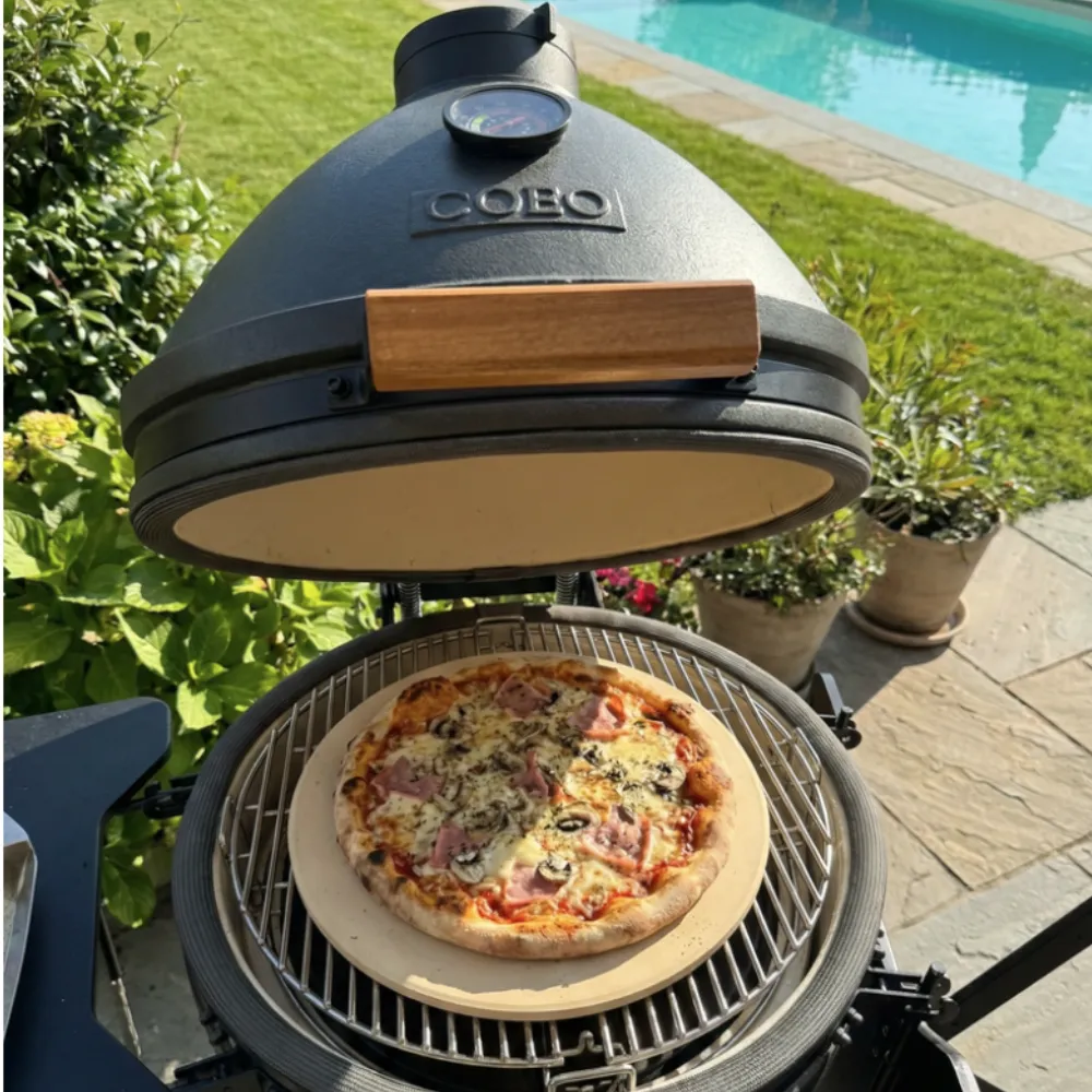 barbecue kamado ceramique pierre pizza.webp